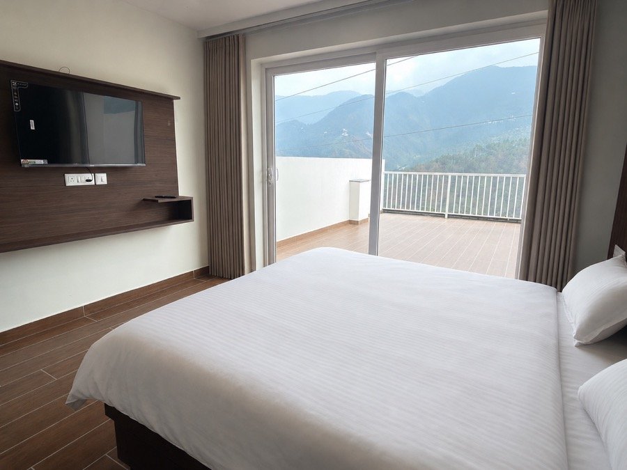 Private balcony with Himalayan views at Pineora Dalhousie